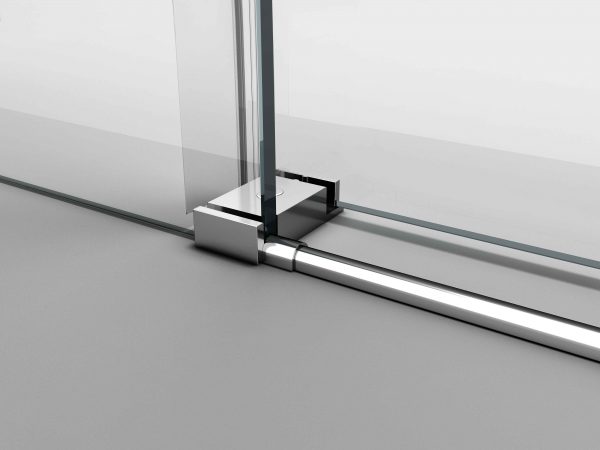 Close-up of Reversible Single Sliding Frameless Shower Door in Brushed Silver Finish